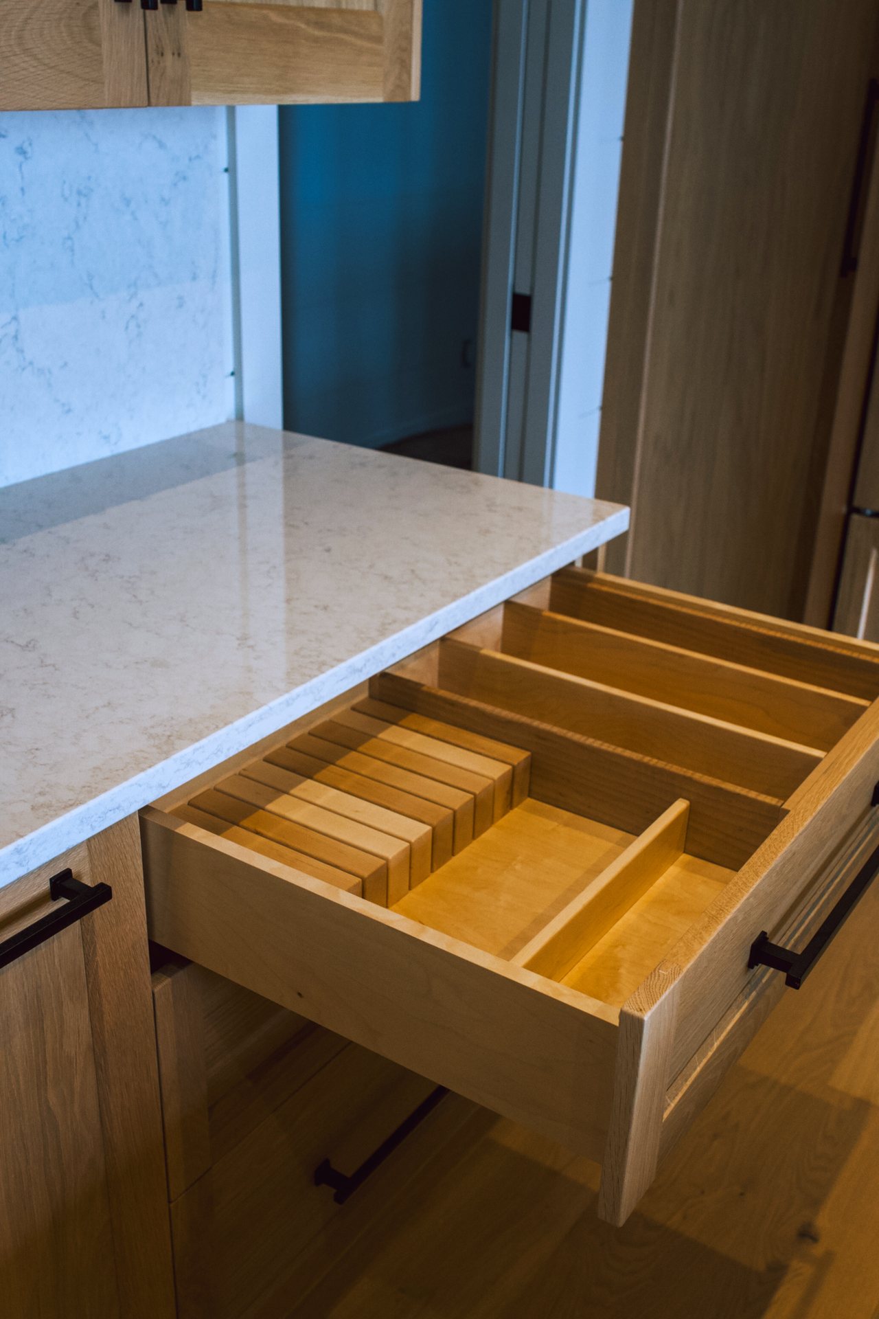 Oak drawer with built-in knife block and utensil dividers